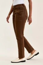 Mahogany wash jeans with front button closure, curved front pockets, tapered leg