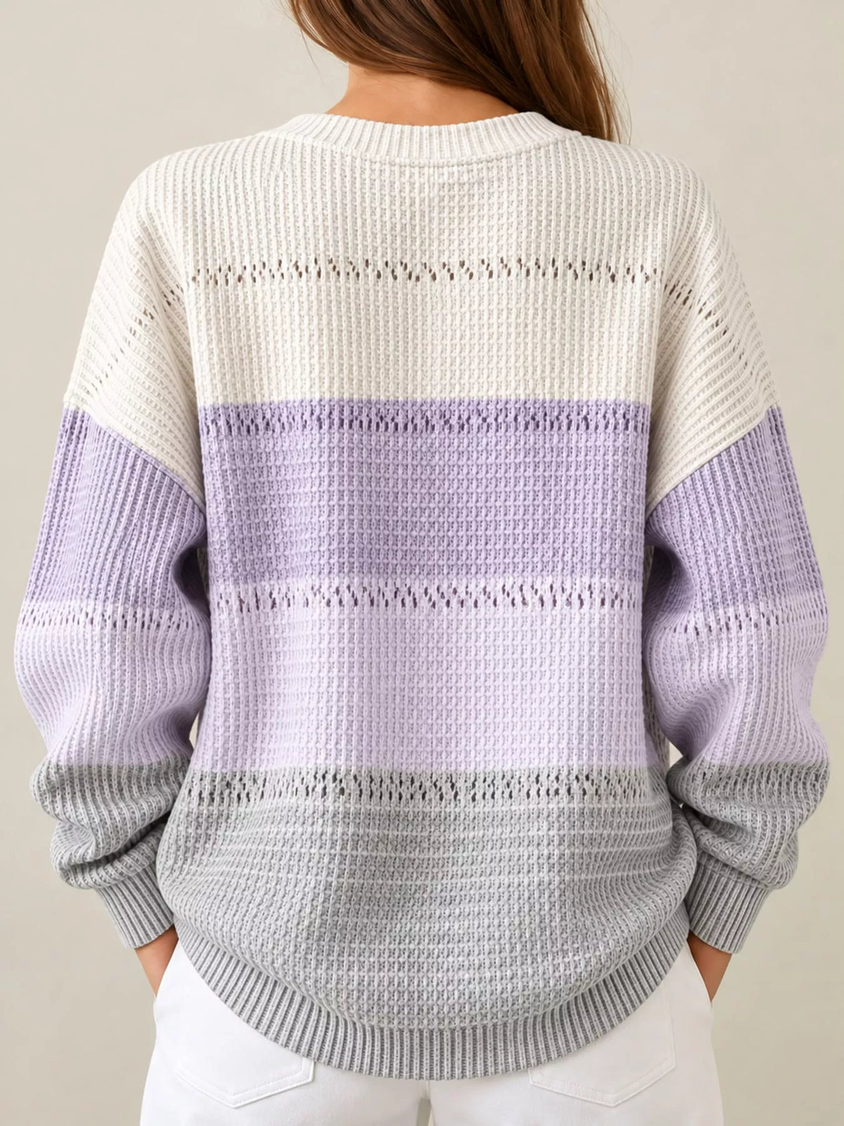 Back view of lavender and white color-block knit henley sweatshirt, long sleeves