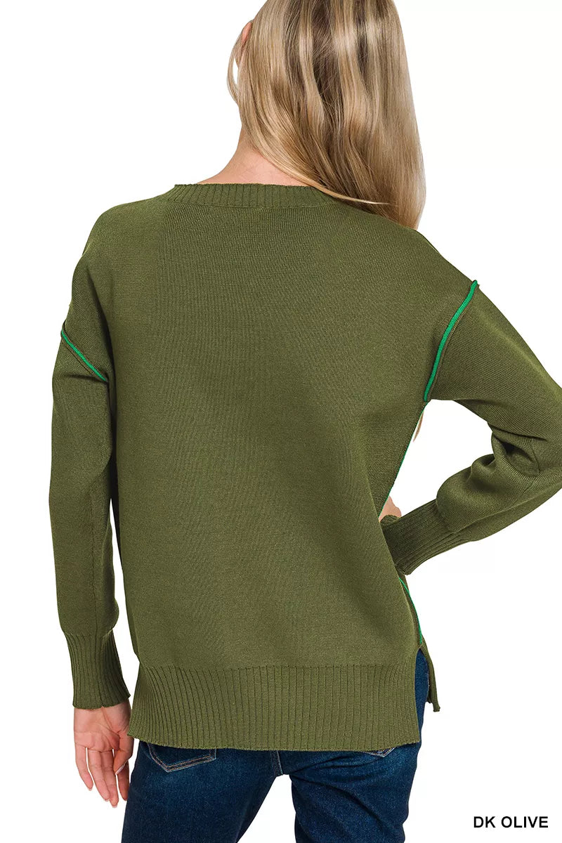 Olive knit top back view with contrast green trim on sleeve edges and cuffs