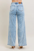 Plus size high-waist wide-leg jeans, light wash denim, back pockets and yoke