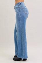Light blue mid-rise wide-leg jeans with stitched back yoke and rear pockets