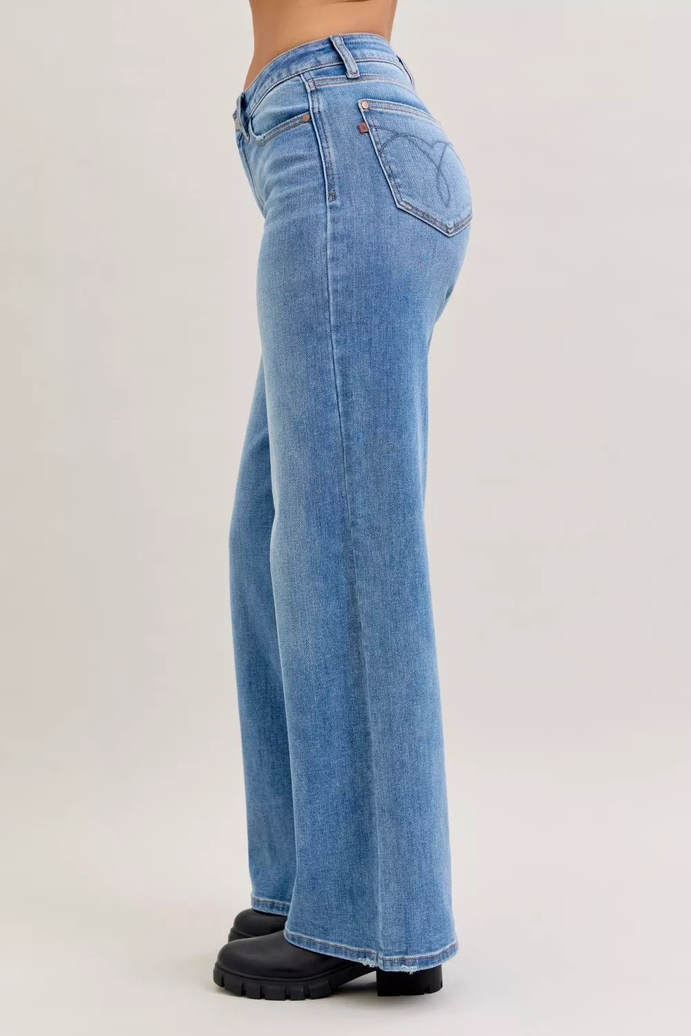 Light blue mid-rise wide-leg jeans with stitched back yoke and rear pockets