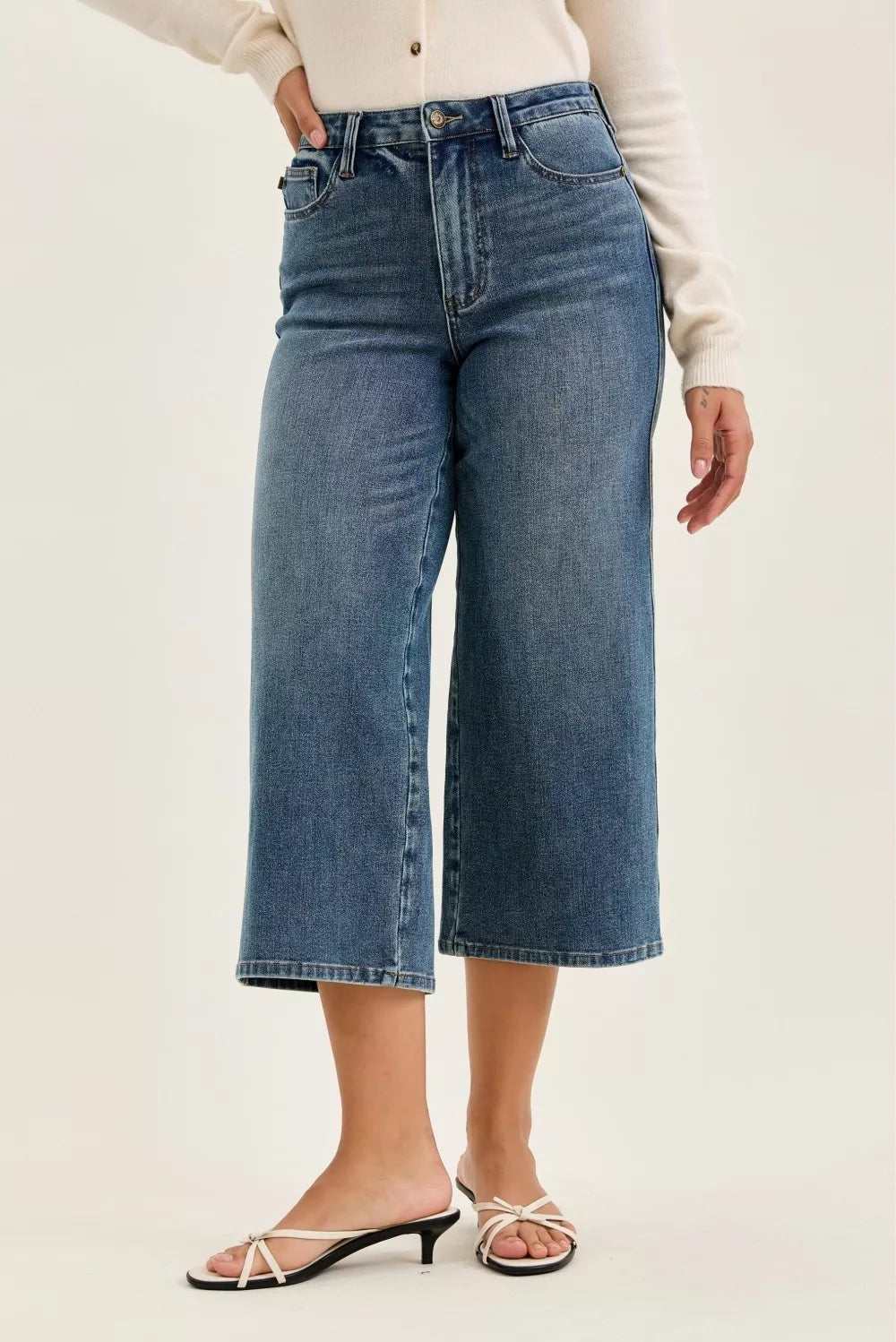 Mid-wash wide-crop jeans, back view with yoke and two patch pockets