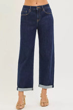 Dark blue wide-leg cropped jeans with cuffed hems and button waist