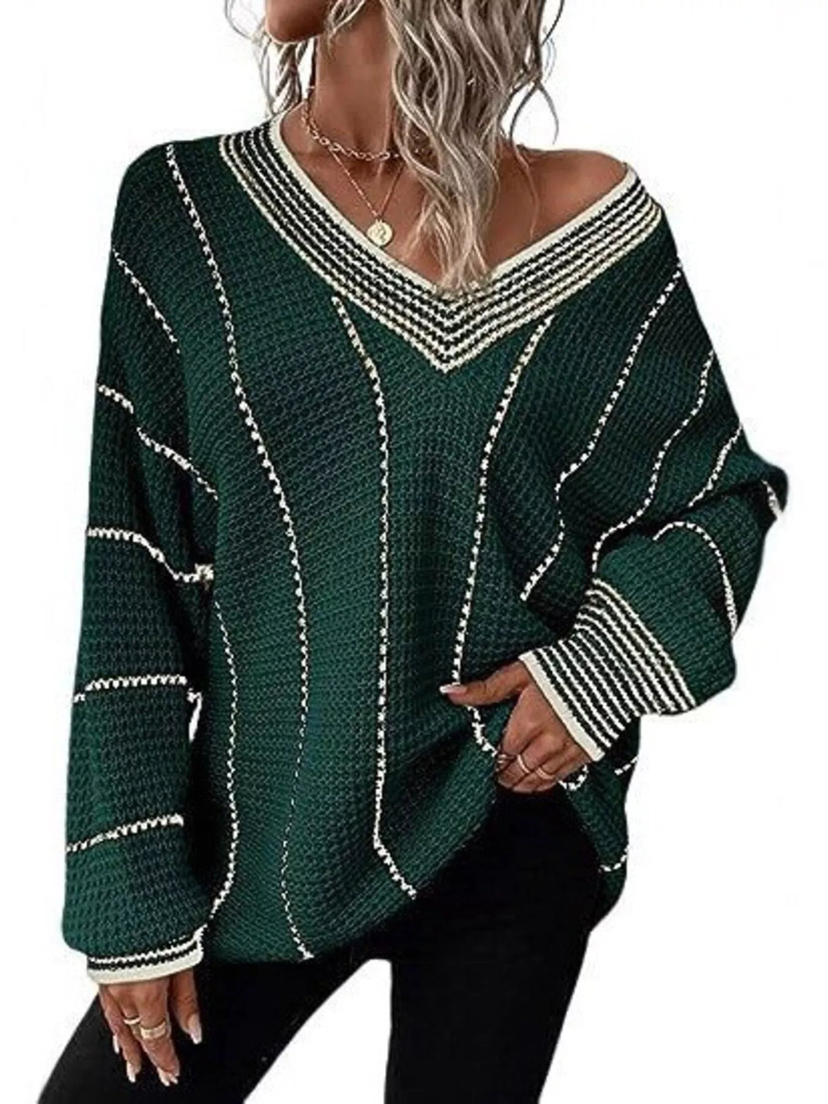 Green textured knit V-neck sweater with cream contrast stripes and ribbed cuffs.