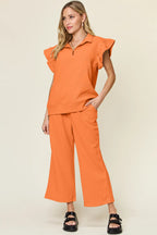 Orange ruffle sleeve top and wide-leg pants matching set with short flutter sleeves