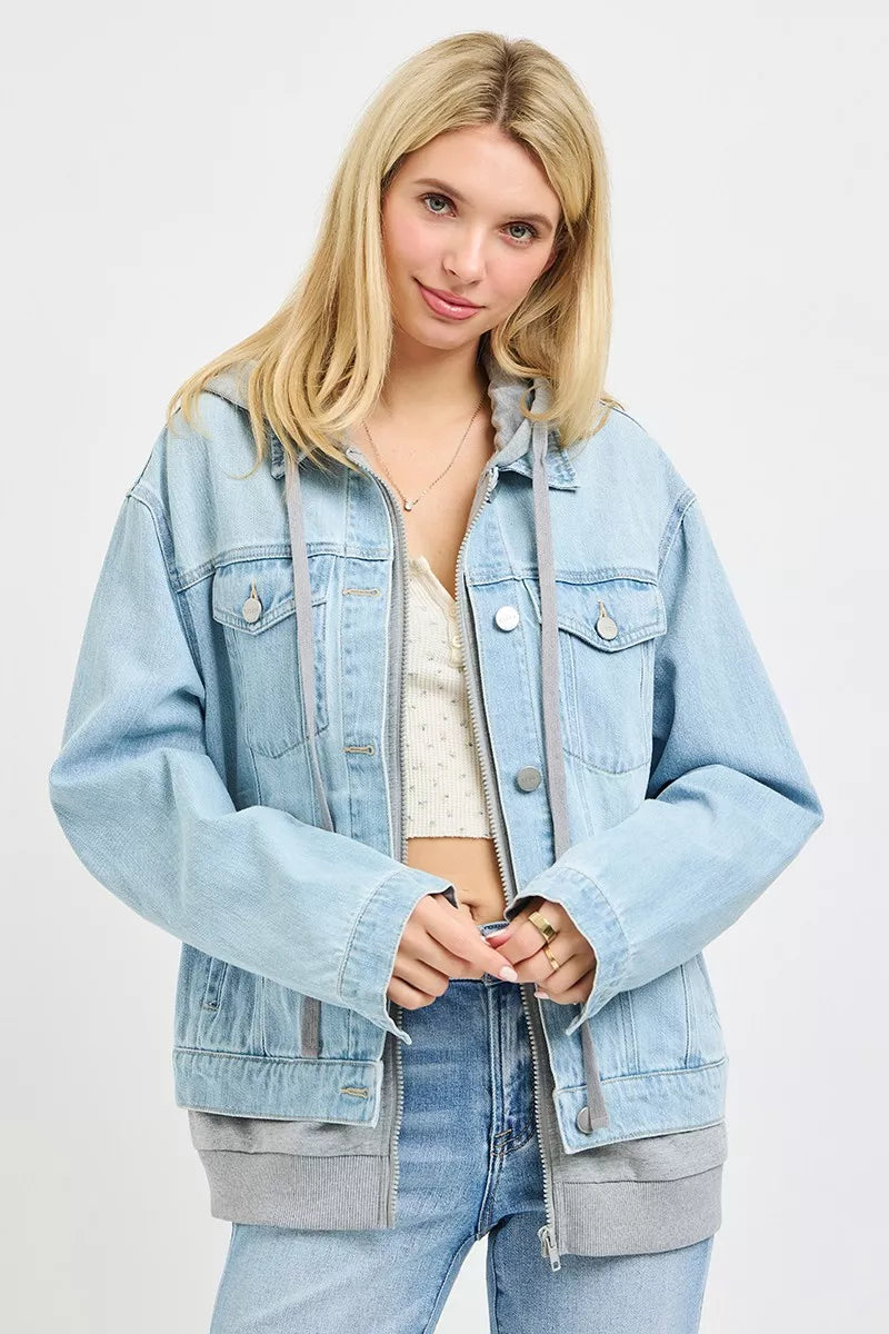 Oversized hooded light-wash denim jacket with front snap buttons and two chest pockets