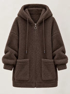 Brown fleece zip-up hoodie with drawstring hood and two front pockets