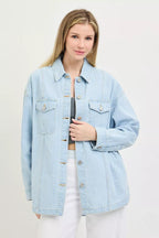 Light blue denim shacket with button front and two flap chest pockets