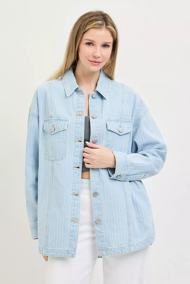Light blue denim shacket with button front and two flap chest pockets