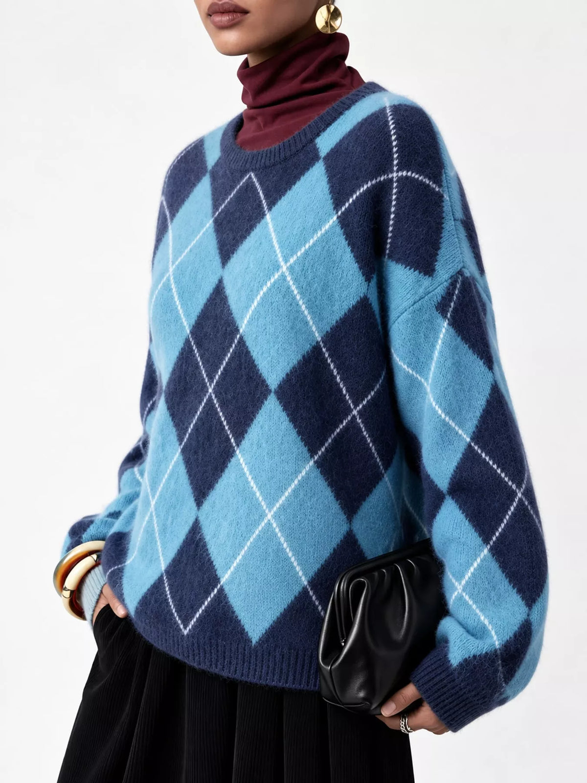 Fuzzy argyle knit sweater in sky blue and navy with white diamond pattern, long sleeves
