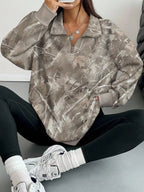 Light gray camo zip-neck oversized sweatshirt, half-zip neck and long sleeves