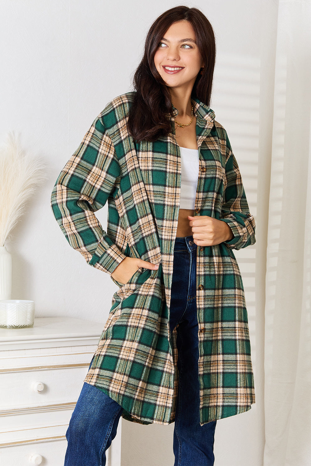 Plaid collared long-sleeve button-up shirt in dark green and beige tones