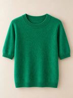 Green round-neck short-sleeve knit sweater with ribbed crew collar and hem.