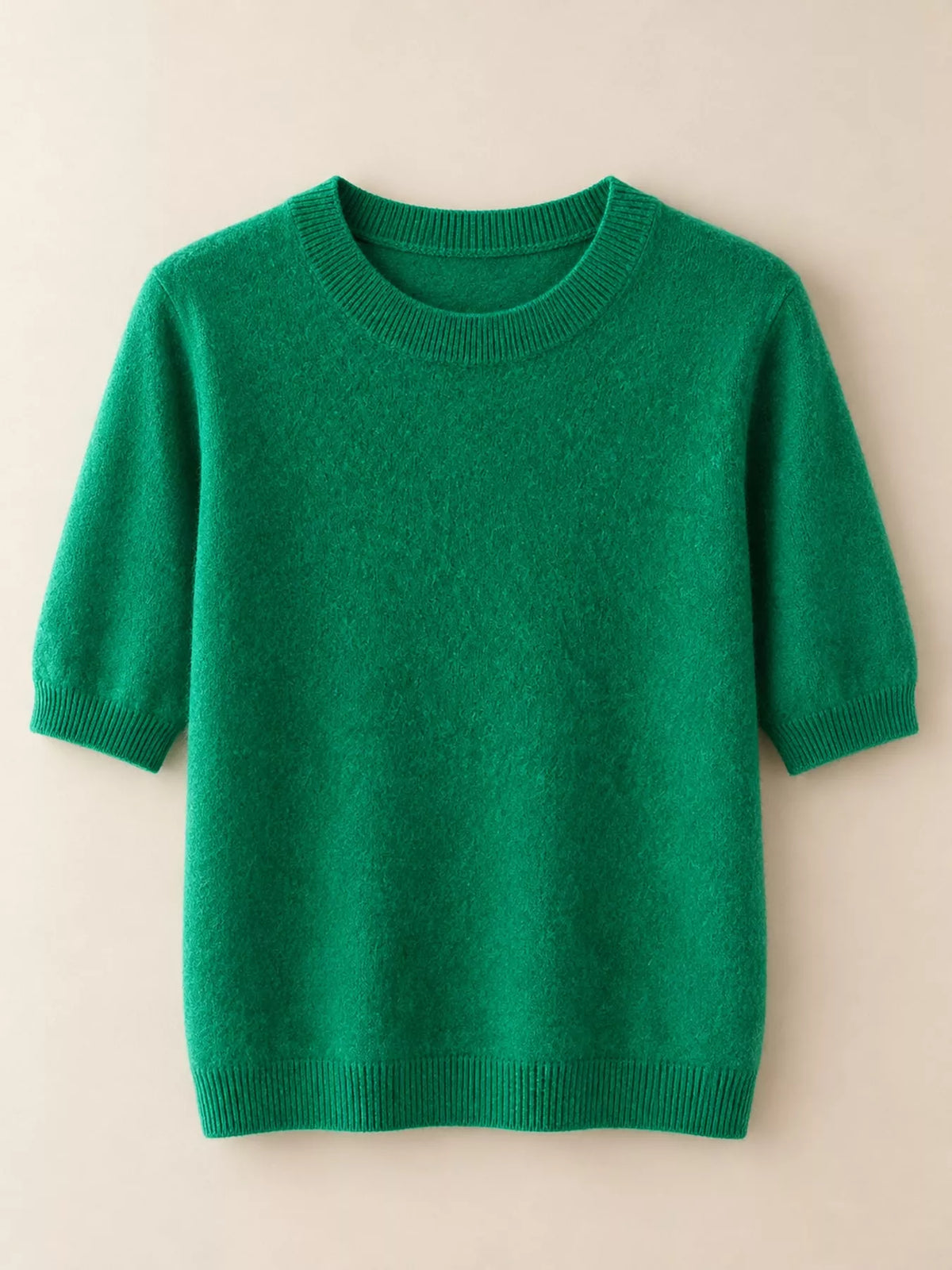 Green round-neck short-sleeve knit sweater with ribbed crew collar and hem.