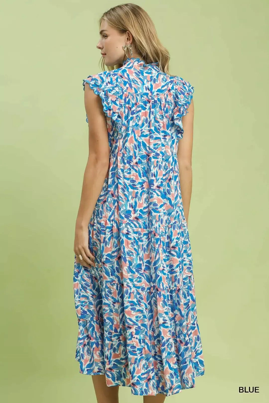 Blue tropical print tiered midi dress with ruffled cap sleeves, back view