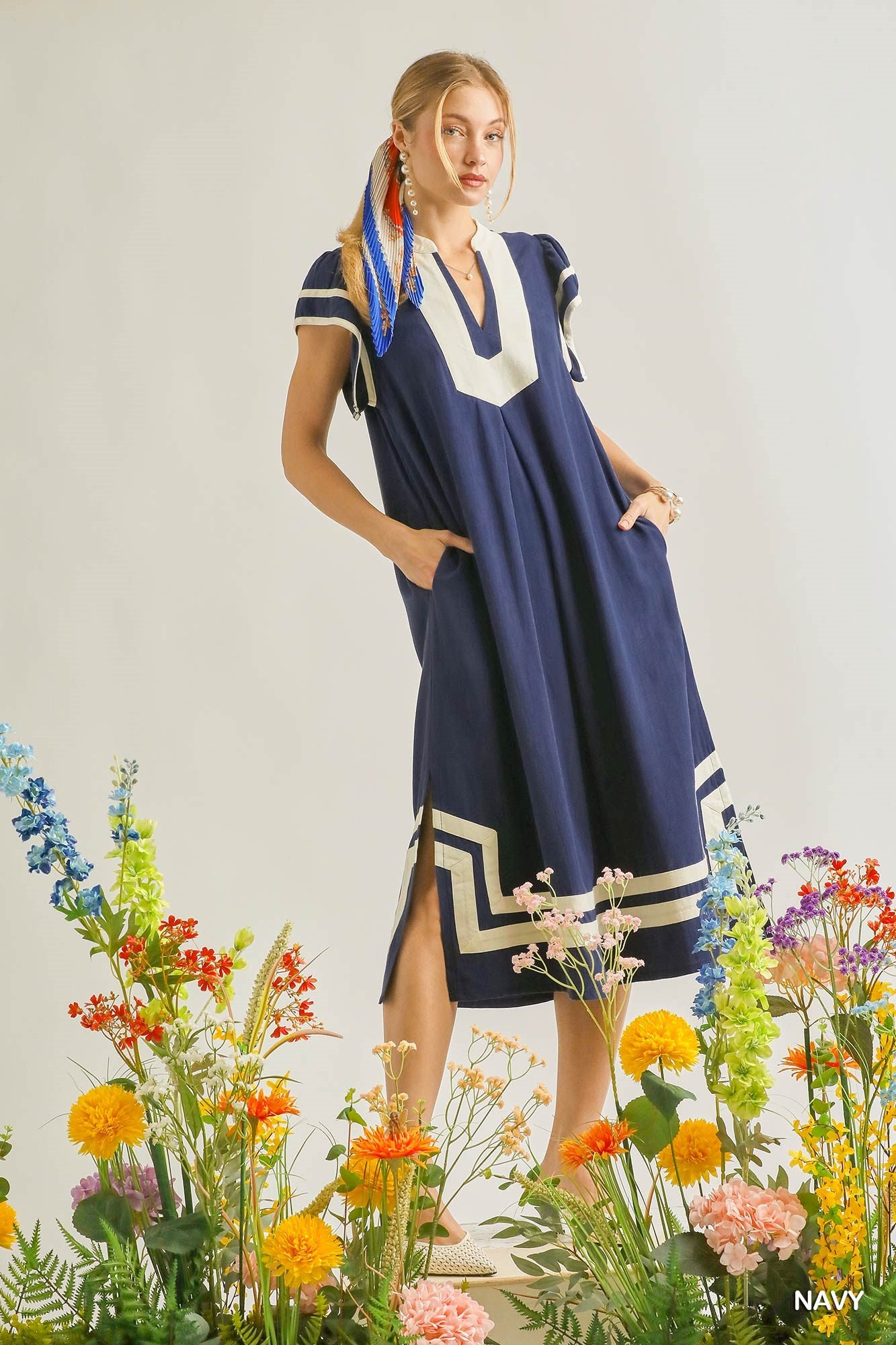 Navy linen-cotton midi dress with V-neck, short sleeves, and white geometric border