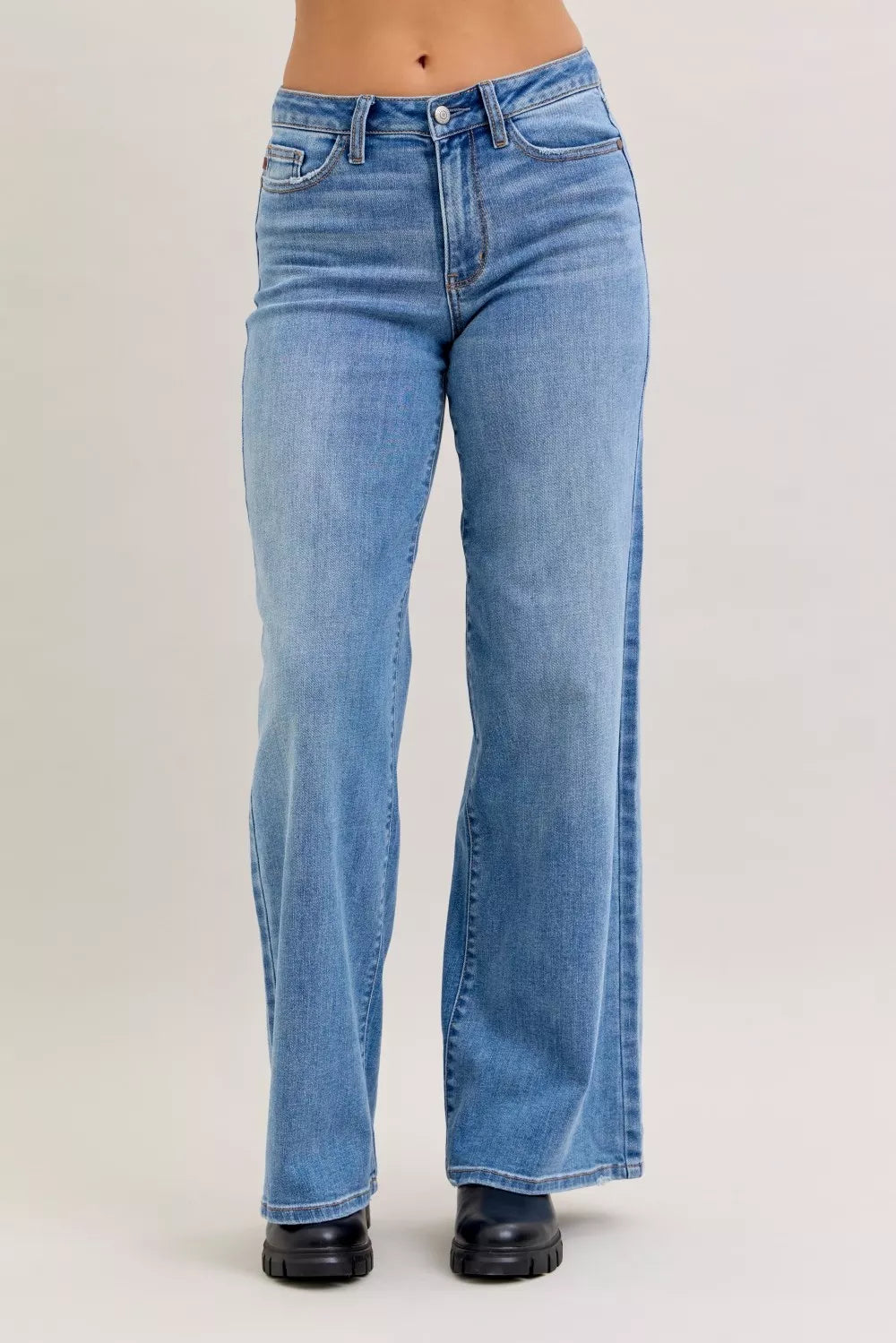 Light blue mid-rise wide-leg jeans with belt loops and buttoned front