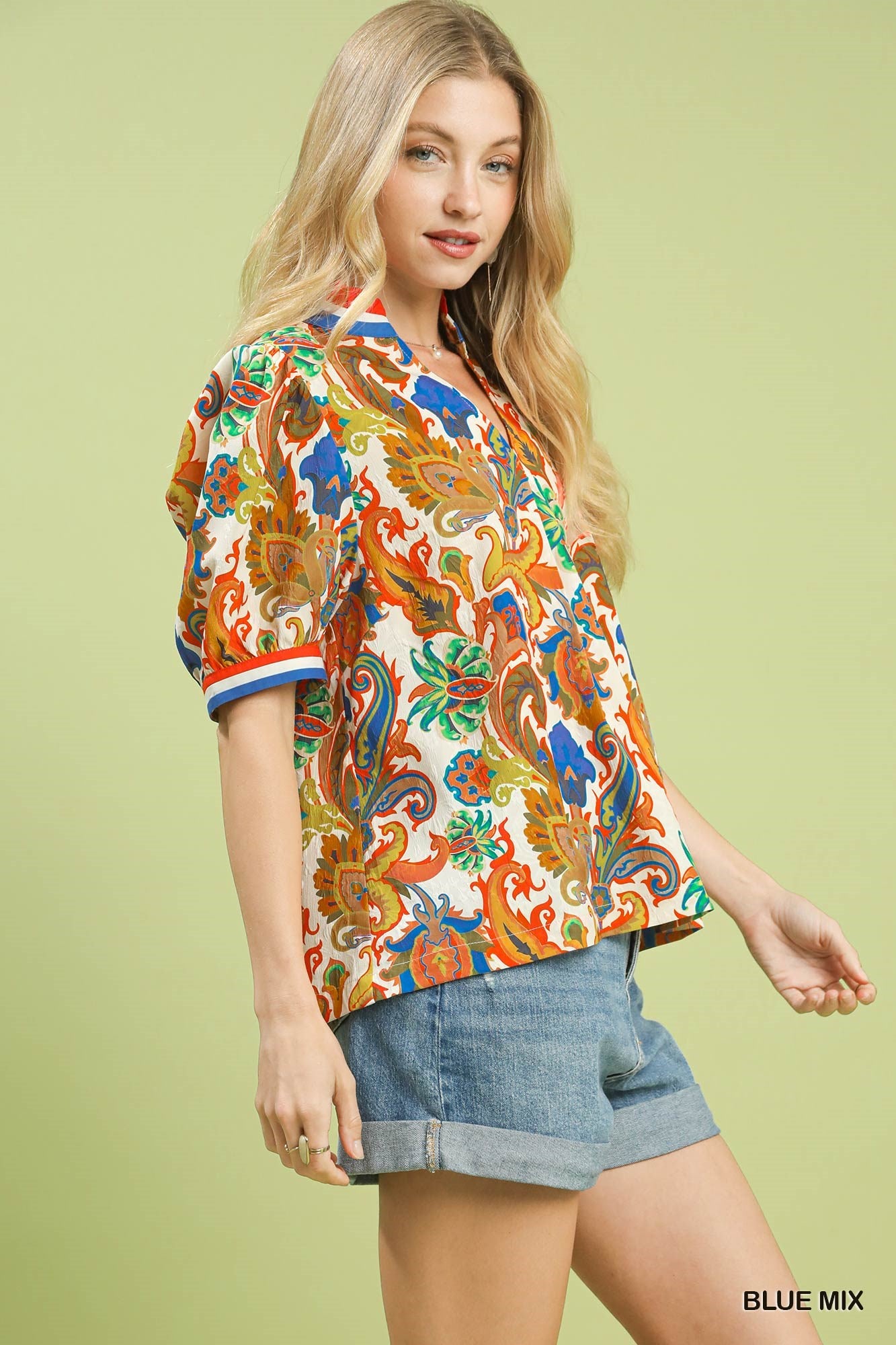 Paisley print v-neck boho blouse with blue trim on short sleeves, multicolor