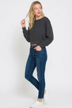 Black cropped boat-neck fleece sweatshirt, relaxed fit, long sleeves
