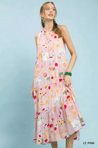 Light pink halter tiered midi dress with colorful abstract fruit print, sleeveless