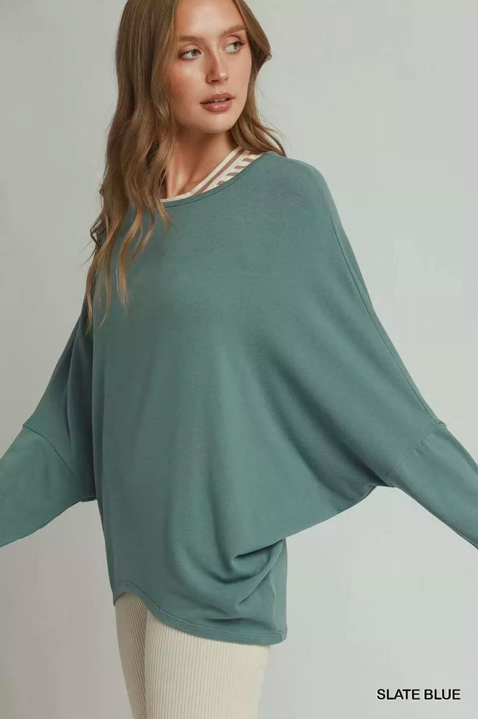 Slate blue batwing long-sleeve top, loose drape silhouette with round neck and cuffed hem
