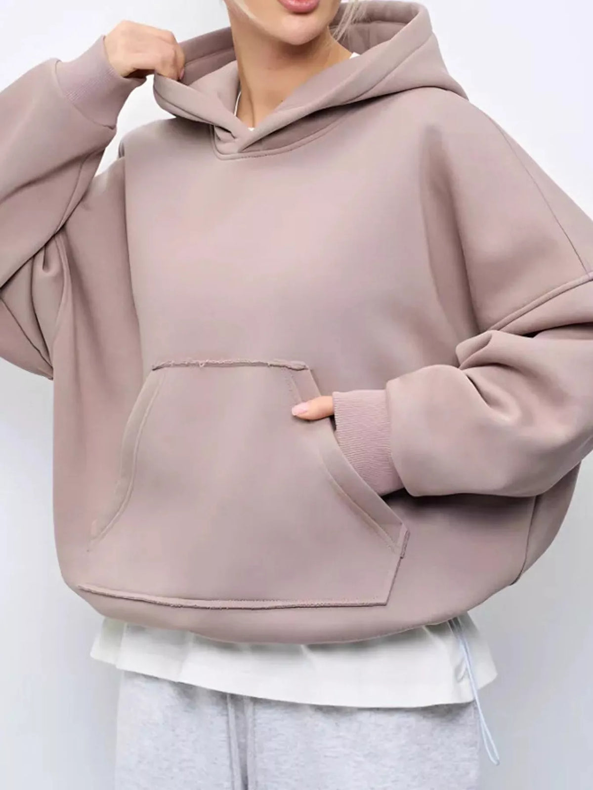 Light mauve oversized kangaroo pocket hoodie with pullover hood and front pouch