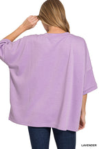 Lavender scuba round-neck top, back view, with short sleeves