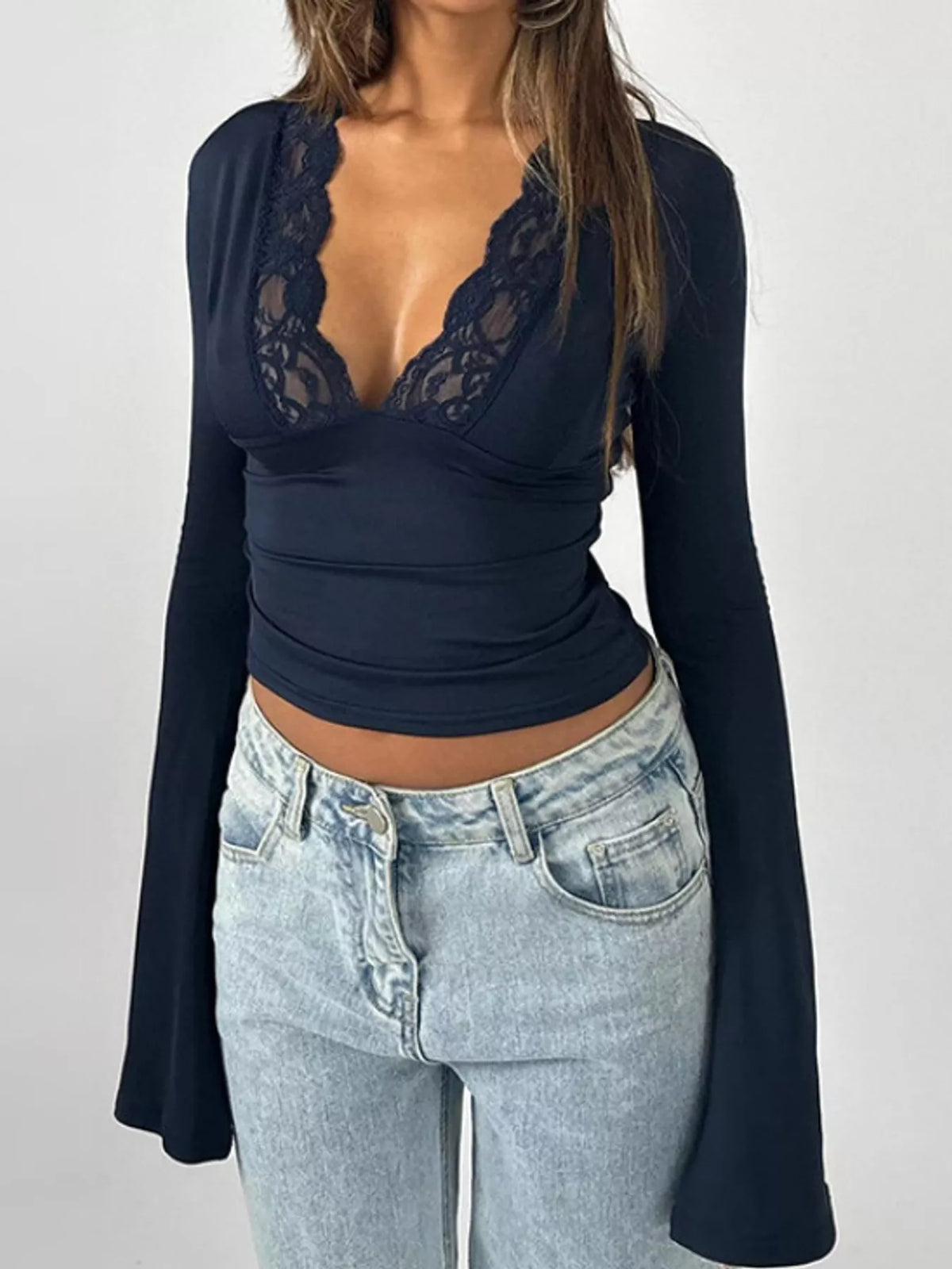Navy lace-trim V-neck long sleeve tee with scalloped lace cups and flared sleeves.