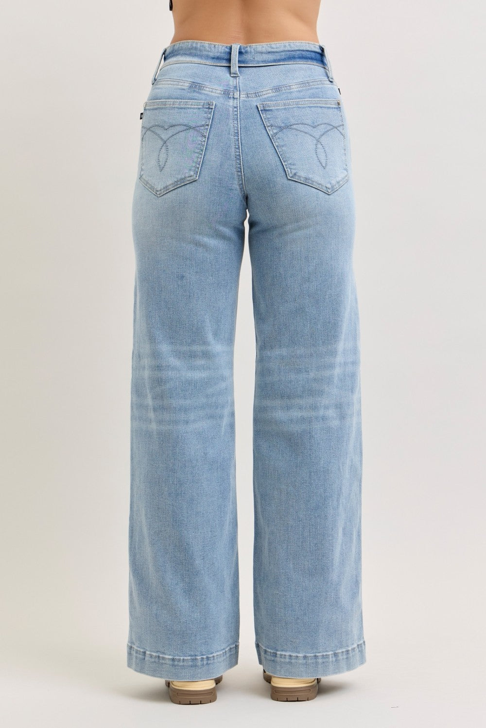 Light wash mid-rise wide-leg jeans, back view with two back pockets