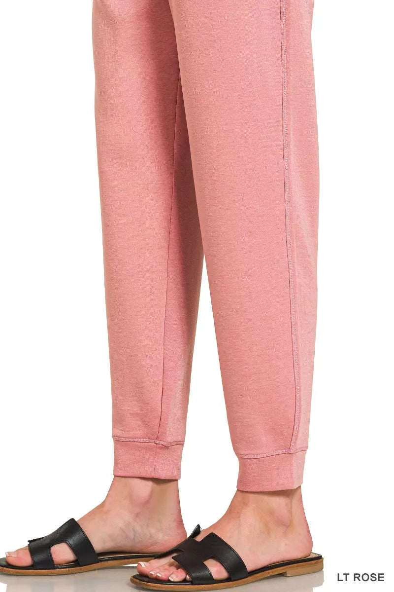 Light rose scuba joggers with elastic cuffs and drawstring waist