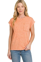 Washed orange short-sleeve tee with chest pocket and relaxed fit