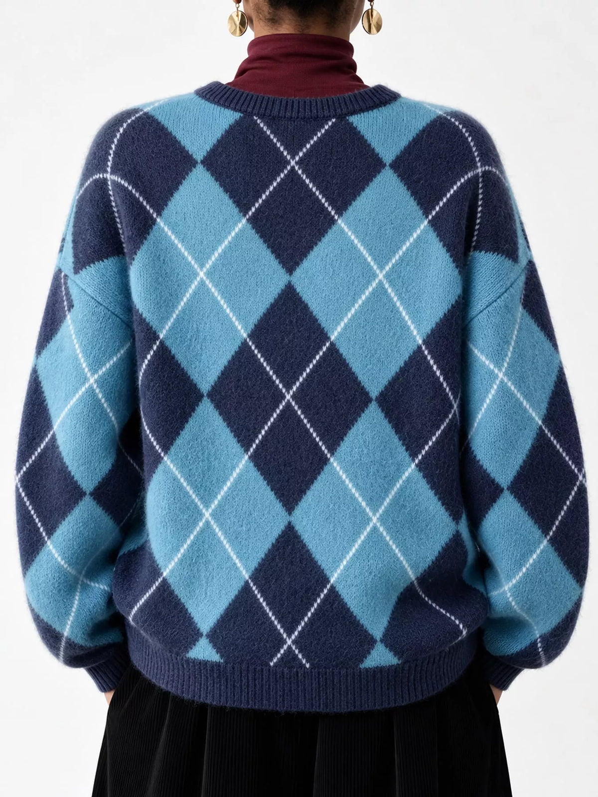 Fuzzy argyle knit sweater back view in sky blue and navy with white diamond pattern