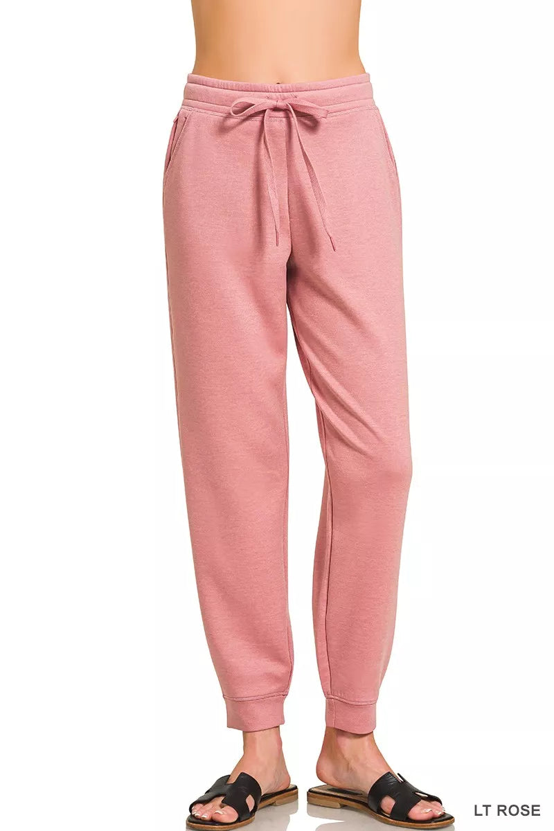 Light rose drawstring scuba joggers with front pockets, tapered cuffs