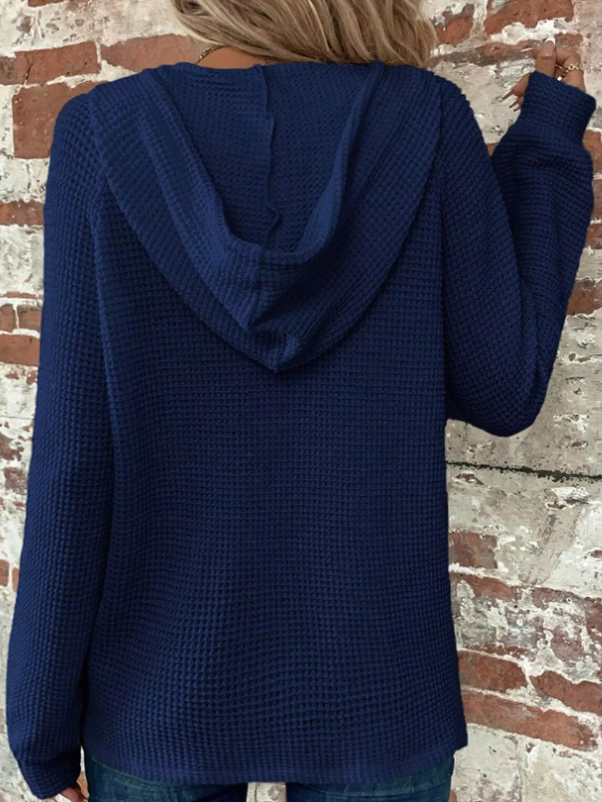 Navy waffle-knit button hoodie with hood and long sleeves, view from back