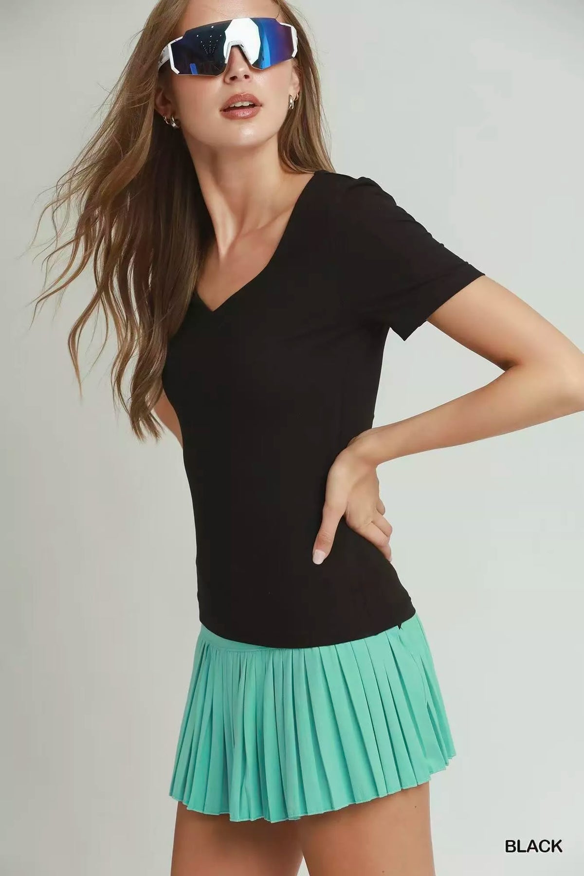 Black short-sleeve fitted top with sweetheart V-neck, double-lined