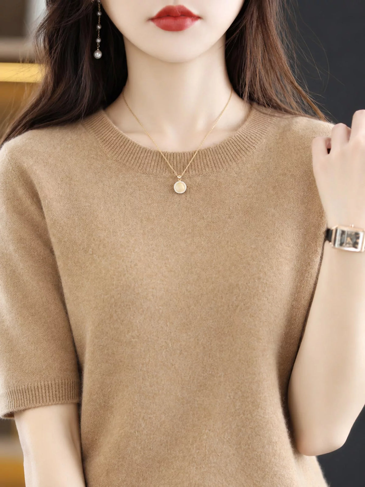 Beige round-neck short-sleeve knit sweater with ribbed neckline and cuffed sleeves