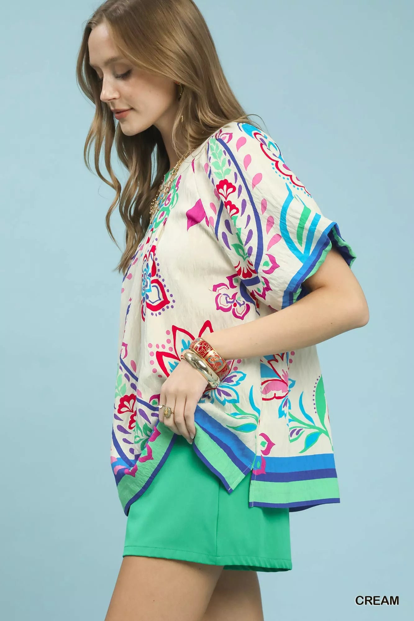 Cream puff sleeve blouse with multicolor border print and floral pattern