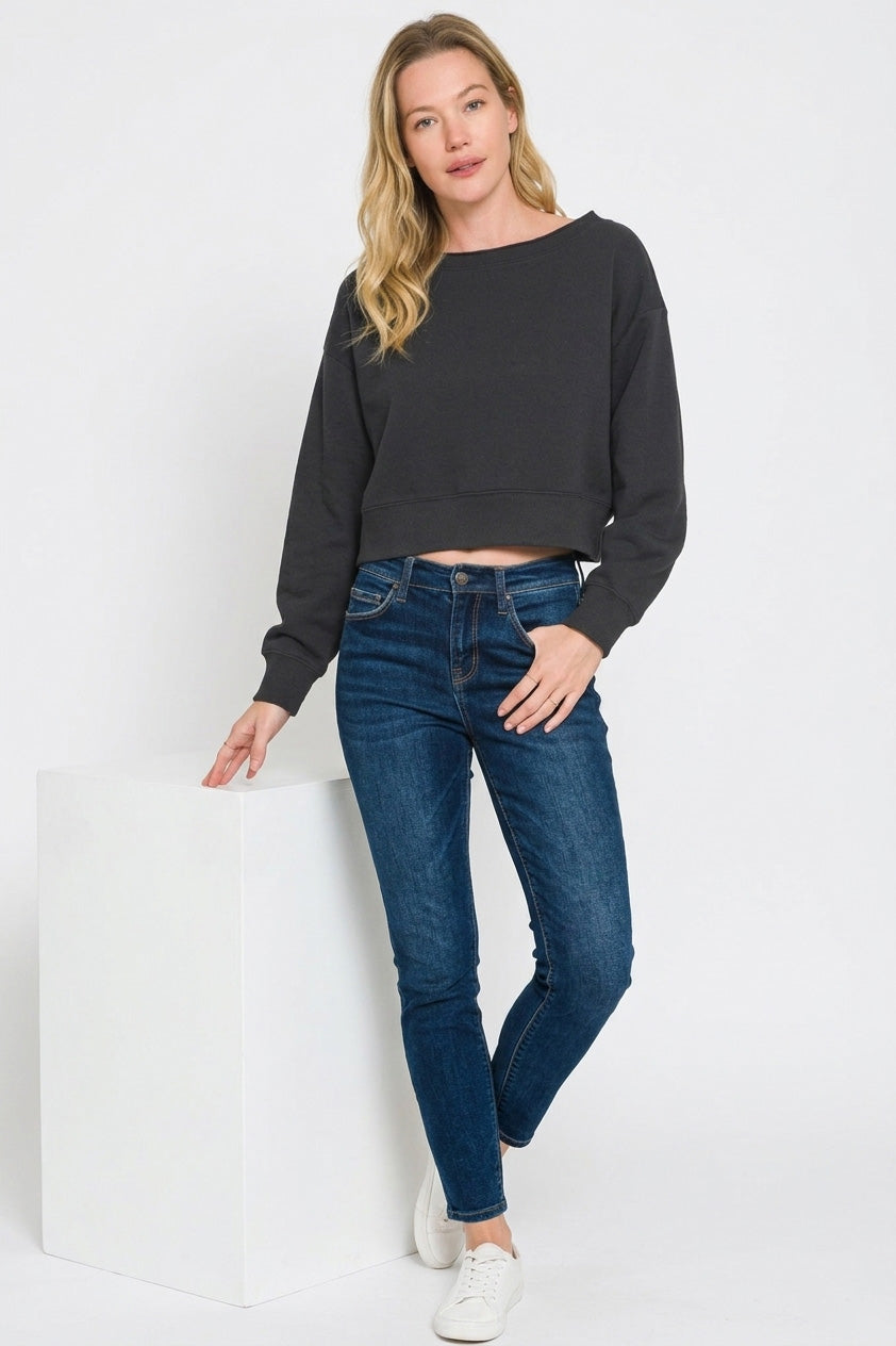 Black cropped boat-neck fleece sweatshirt with crew hem and long sleeves