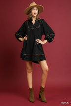 Textured Babydoll Dress with Leopard Trim Trendy & Playful Style