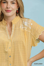 Sunflower embroidered plaid blouse neckline with button placket and scallop cap sleeve