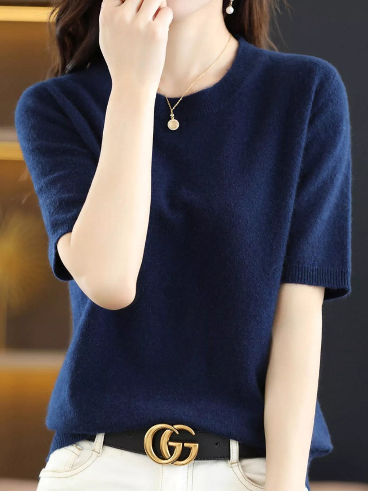 Navy round-neck short-sleeve knit sweater with ribbed crew neckline and cuffs