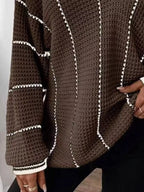 Brown V-neck textured knit sweater with white vertical stripe paneling and ribbed hem