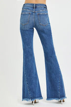 Mid-rise flare jeans for women, blue denim with back pockets and frayed wide-leg cuffs