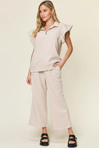 Light gray ruffle sleeve top and wide-leg pants matching set with collared neckline