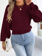 Wine red argyle lantern-sleeve sweater with textured knit sleeves and ribbed waistband