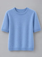 Light blue round-neck short-sleeve sweater, relaxed fit with ribbed trim