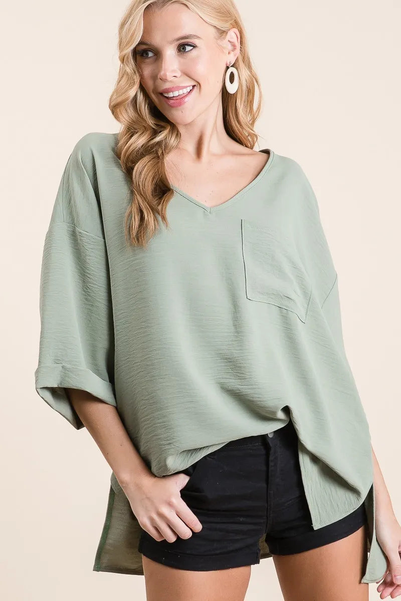 Sage Green Oversized V-Neck Blouse – High-Low Hem & Chest Pocket