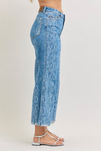 Light blue high-rise ankle wide-leg jeans in snake-print denim