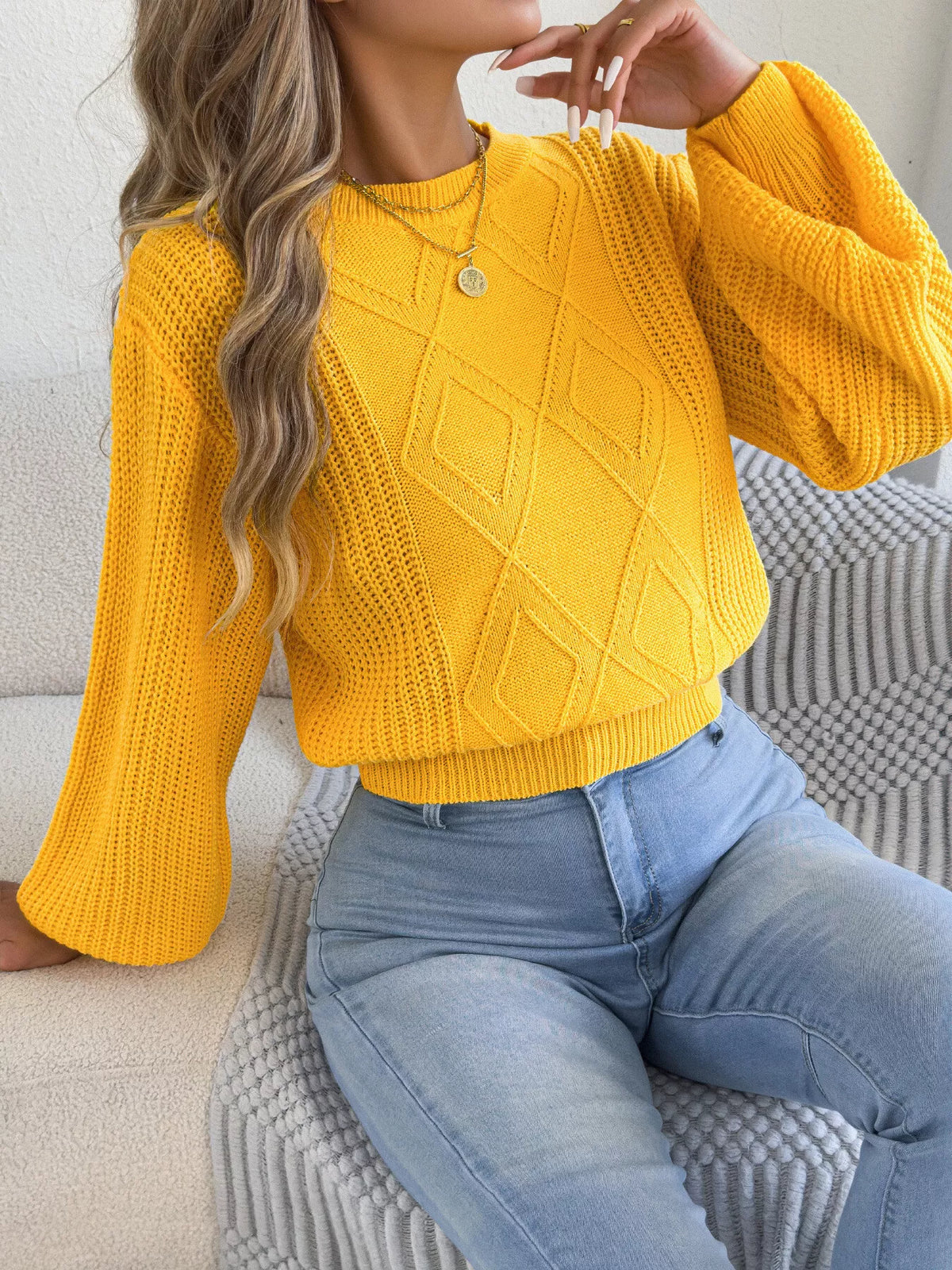 Yellow argyle lantern-sleeve sweater with ribbed crew neck and button-detail collar